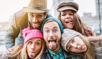 Best friends taking selfie on winter fashion clothes - Happy fri