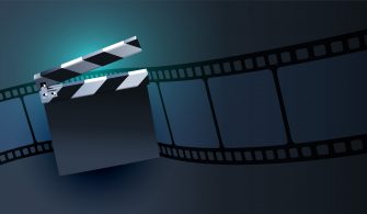 open clapper board with film strip background design